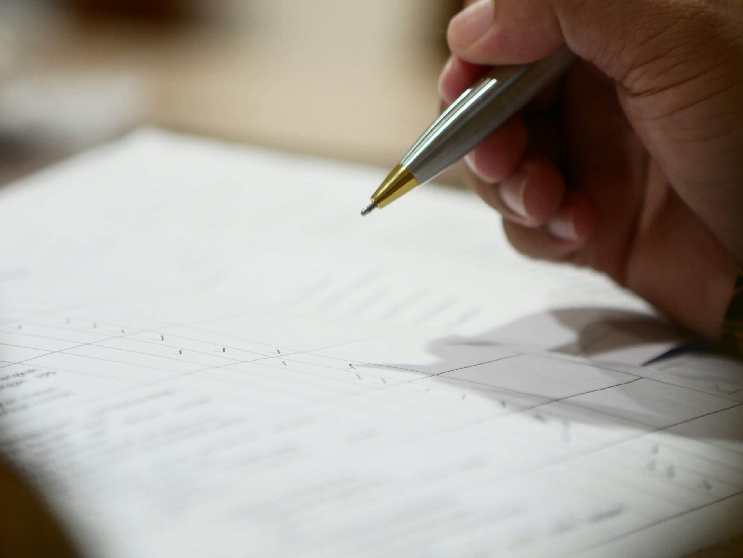 Business professional reviewing supplier documentation as part of a UK vendor due diligence process.